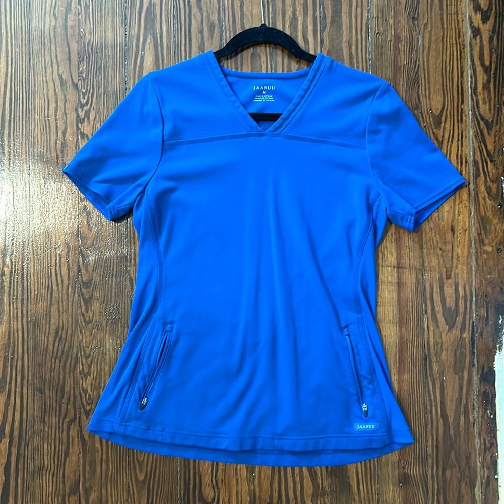 Jaanuu slim fit ultra soft two pocket scrub top in royal blue